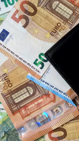 Paper money, euro notes, cash for savings, investments and business transactions. Euro paper cash as a financial background for your design