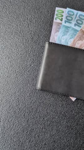 Cash paper money of Brazil, notes as a conceptual background of investment, savings