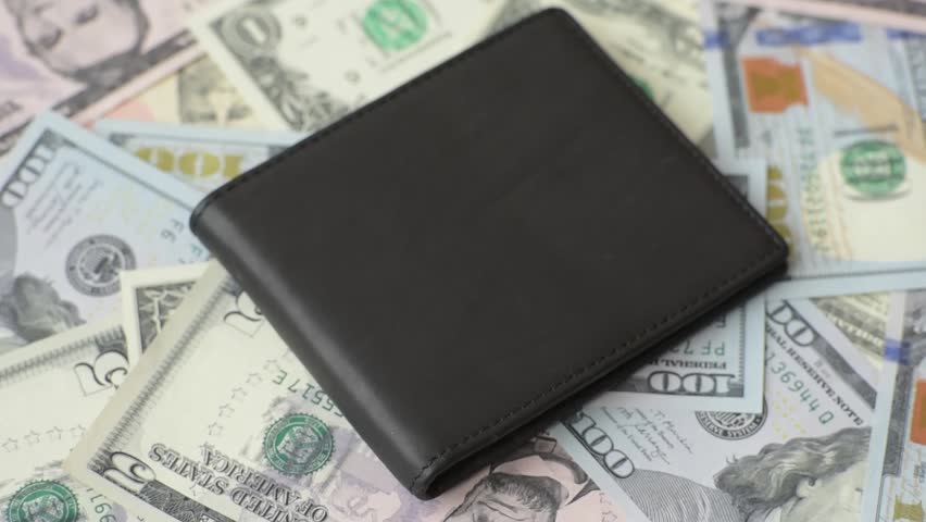 USA money, cash paper dollars, american business and financial transactions. Cash dollars in bills of different denominations as a conceptual background