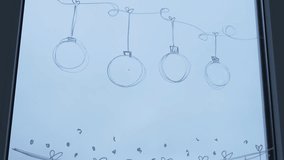 Sustainable responsible holiday decor. Female hand painting year number 2025 painted on window glass indoor at home. Christmas winter decoration. White pattern. Snow art tracery on season. Diy - Powered by Shutterstock - Get 15% off with code: PIKWIZARD15