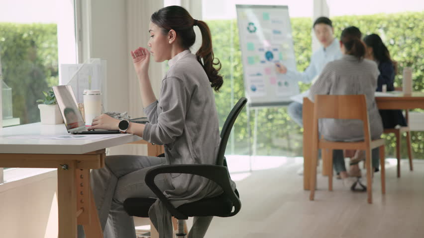 Asia people young adult woman bad day work hard bored data tired at office desk workplace think worry job tough stress asian workforce issue. Mid life crisis mental health illness sad labor effort.