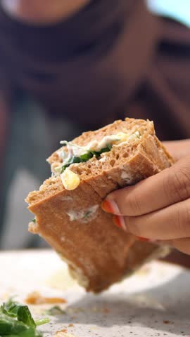 Tasty sandwich enjoyed at a cozy cafe during lunchtime