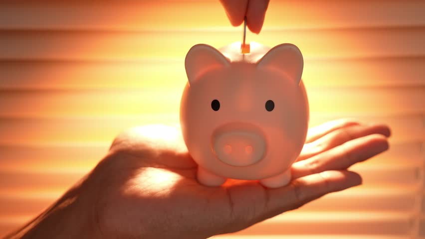 A freelancer consistently drops coins into a piggy bank under sunlight, representing steady saving, financial independence, planning for the future, self-reliance, and building long-term stability.
