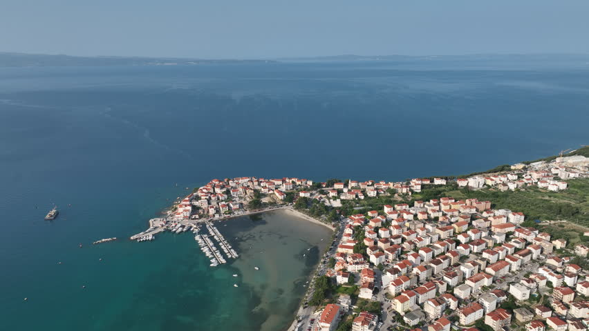 Tranquil Croatian Coastline Featuring Peninsula Settlement and Marina