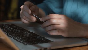 Digital transactions and online payments. A woman transfers money online using bank credit card and laptop. - Powered by Shutterstock - Get 15% off with code: PIKWIZARD15