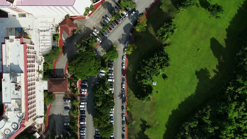 Above View Of The Parking Lot At Hilton Guam Resort And Spa In Tumon Bay, Hilton Road, Tumon, Guam. Aerial Topdown Shot