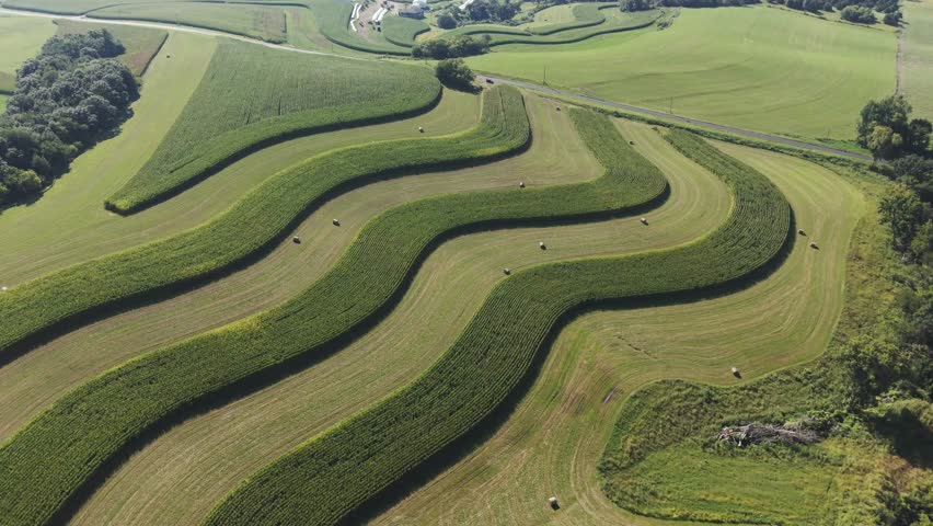 Wisconsin Contour Farm Field. Contour Farming is a conservation practice that involves performing farming operations across a field’s slope, as close to the contour as possible.