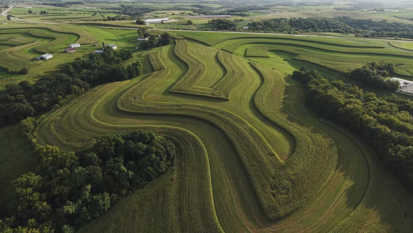 Wisconsin Contour Farm Field. Contour Farming is a conservation practice that involves performing farming operations across a field’s slope, as close to the contour as possible.