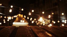String lights create cozy mood with a single bulb flickering in golden bokeh - Powered by Shutterstock - Get 15% off with code: PIKWIZARD15