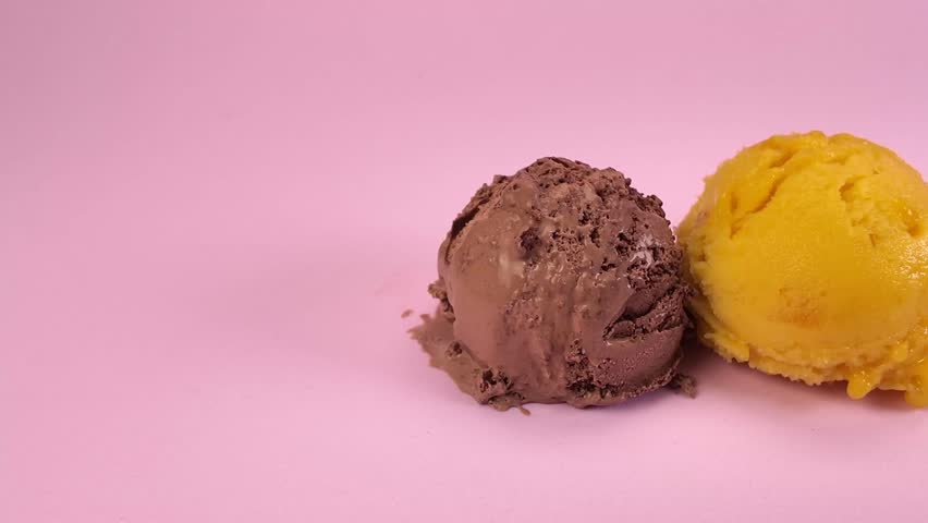 Set of ice cream scoops on pink background creating summery vibes, motion