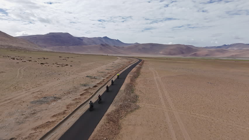Group of Bikers on Long Highway Drone View