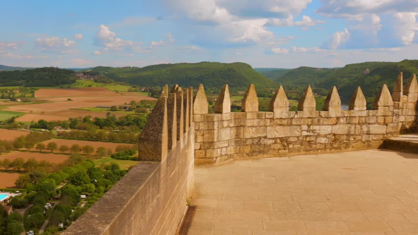 Scenic Countryside Landscape View From The Castle Tower Of The Château de Beynac In France. Panning Shot