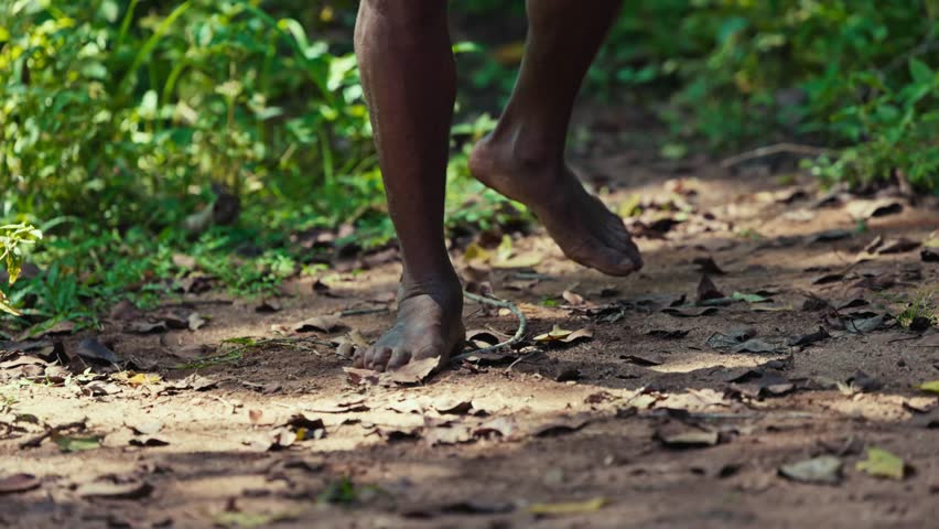 Vedda tribesman of Sri Lanka dancing a ritual dance before hunting, traditional lifestyle, and connection to nature. Tribal portrait in native Habitat 120 fps slow motion. 02.03.2022 SRI LANKA