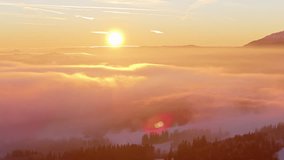 Golden sunrise over the snow-covered Tatra Mountains and Podhale region, with mist gently covering the valleys, creating a serene and atmospheric winter landscape. - Powered by Shutterstock - Get 15% off with code: PIKWIZARD15