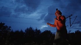 A talented Martial artist performs impressively, showcasing dynamic moves against a stunning, dramatic nighttime backdrop. Slow motion - Powered by Shutterstock - Get 15% off with code: PIKWIZARD15