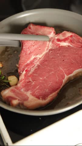 T-bone steak roast cut of meat juicy roast beef tasty snack fresh gourmet food background on the table rustic food top view copy space