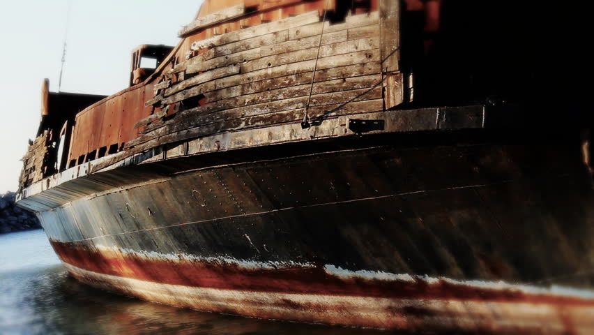 Old Abandoned Ship 2. A rusted old abandoned ship on the Lake Ontario of the