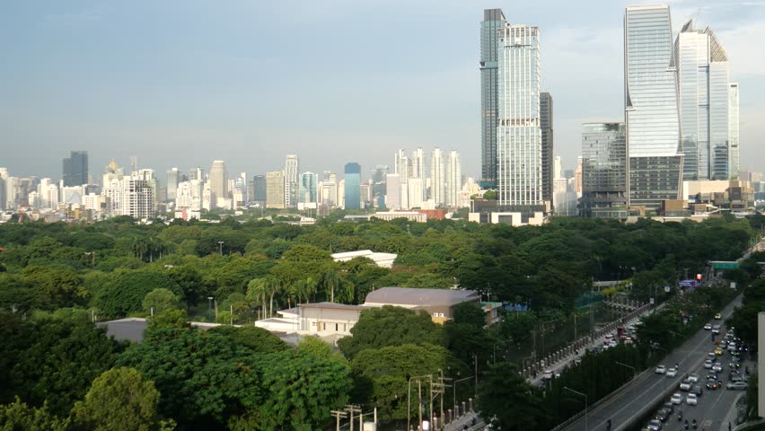 Bangkok skyline and city public park