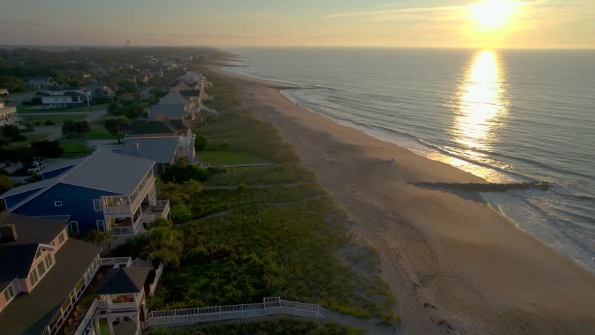 Aerial Sunrise over Edisto Island South Carolina with Beach Houses by the Ocean