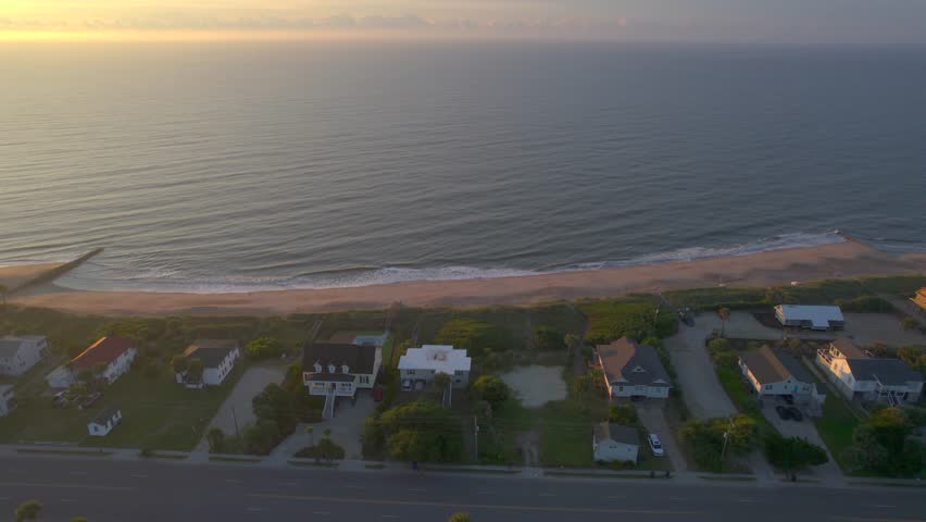 Aerial Sunrise over Edisto Island South Carolina with Beach Houses by the Ocean