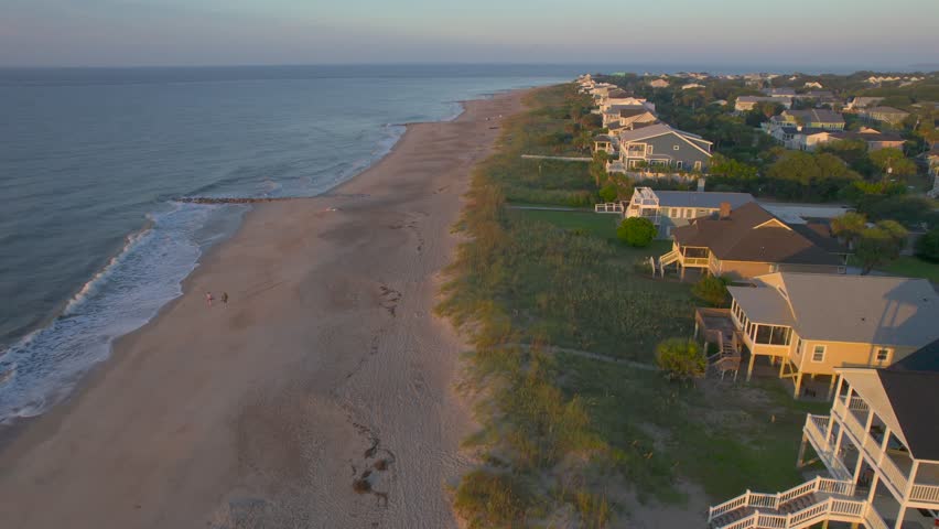 Aerial Sunrise over Edisto Island South Carolina with Beach Houses by the Ocean