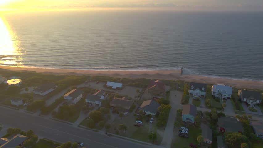Aerial Sunrise over Edisto Island South Carolina with Beach Houses by the Ocean
