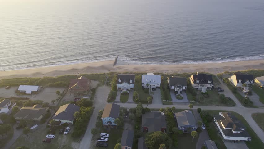 Aerial Sunrise over Edisto Island South Carolina with Beach Houses by the Ocean