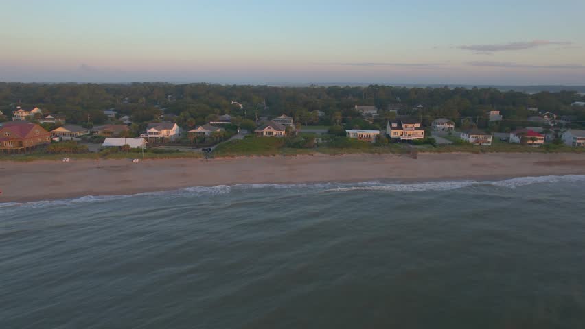 Aerial Sunrise over Edisto Island South Carolina with Beach Houses by the Ocean