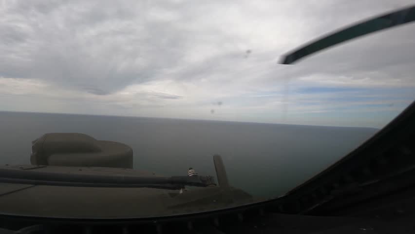 AH-64E Apache Guardian helicopter fires Spike NLOS missile.