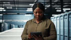 Close up of admin working in data center managing and optimizing network infrastructure. IT expert walking through server room rows diagnosing and resolving hardware malfunctions - Powered by Shutterstock - Get 15% off with code: PIKWIZARD15