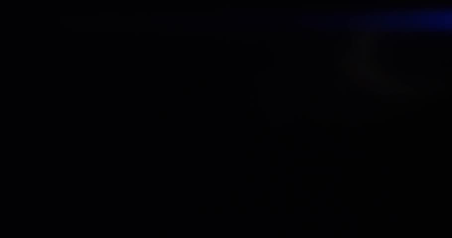Mystical light leak with violet sparkles and ethereal light bursts, ideal for fantasy trailers, magical promos, and atmospheric stock footage