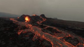 Spectacular volcanic eruption displays flowing lava and glowing magma activity - Powered by Shutterstock - Get 15% off with code: PIKWIZARD15