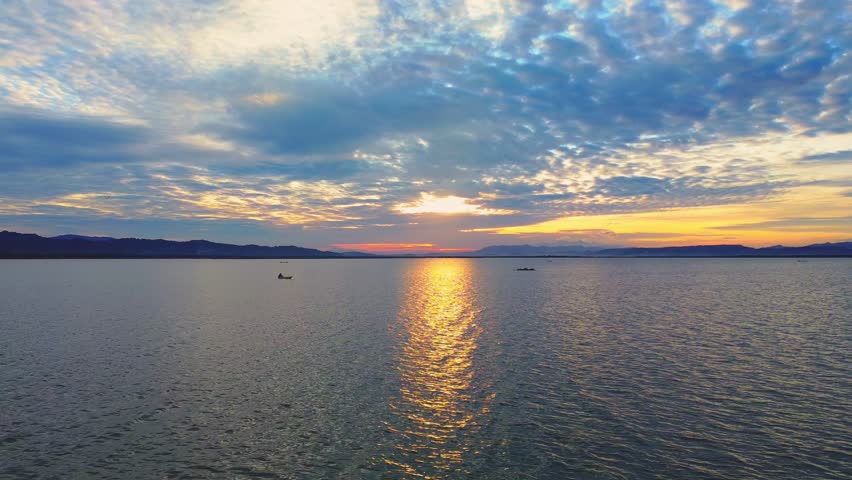 Scenic Sunset Over Lake with Reflections