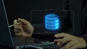 Data analytics concept, infographic dashboard showing KPIs, performance metrics, and business insights from large data sets. Businessman shows motion graphic of database on virtual screen. - Powered by Shutterstock - Get 15% off with code: PIKWIZARD15