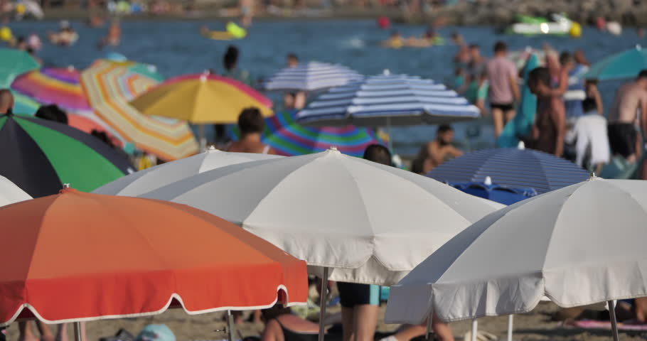 Beach umbrella in the South of France. The Mediterranean Sea during the summer time.