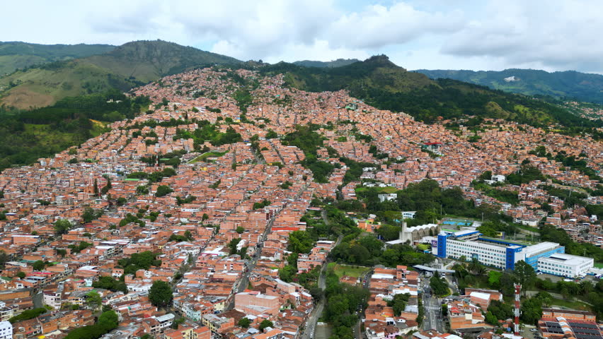 Aerial drone view of Medellin, historic hillside town in Colombia in daylight