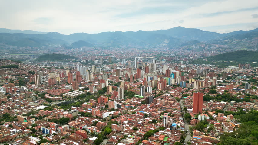Aerial drone view of Medellin, historic hillside town in Colombia in daylight