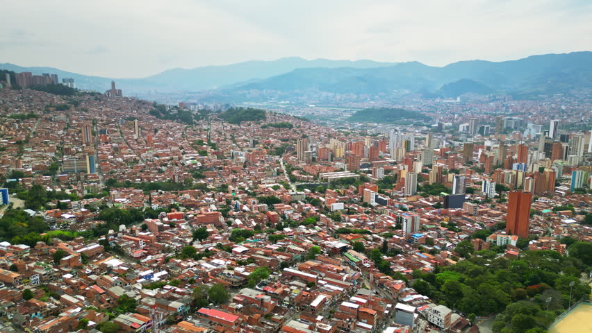 Aerial drone view of Medellin, historic hillside town in Colombia in daylight