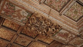 decorated wooden ceiling featuring painted panels and baroque gold carving - Powered by Shutterstock - Get 15% off with code: PIKWIZARD15