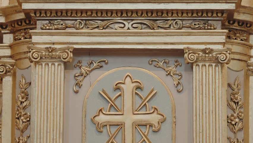 ornate sacrario tabernacle with golden cross wheat and grapes