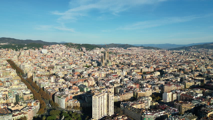Aerial drone view of the Gothic Quarter in Barcelona, Spain, with the iconic Barcelona Cathedral standing at the center
