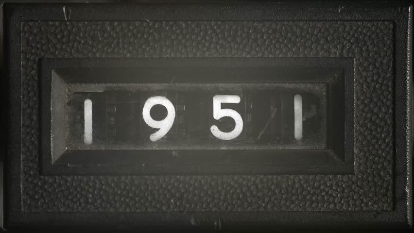 Vintage counter slowly flips from 1951 to 1961, retro numeric display symbolizing time passage, countdown, decade transition, and archival timeline.