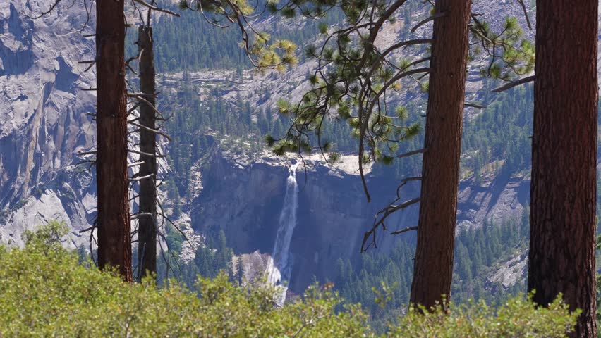 Dramatic waterfall known as Nevada Falls flowing through Yosemite National Park