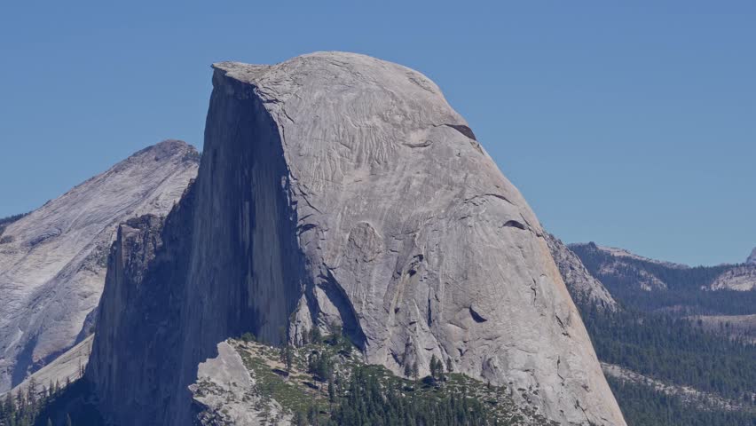 Half Dome in Yosemite National Park captured in detail as the shot transitions from close to wide view of the granite landmark.