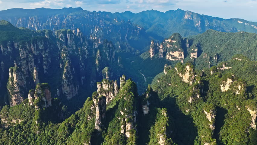 
Majestic Zhangjiajie national forest park: towering sandstone pillars with lush green forest natural landscape, Wulingyuan Scenic Area, Hunan Province, China.