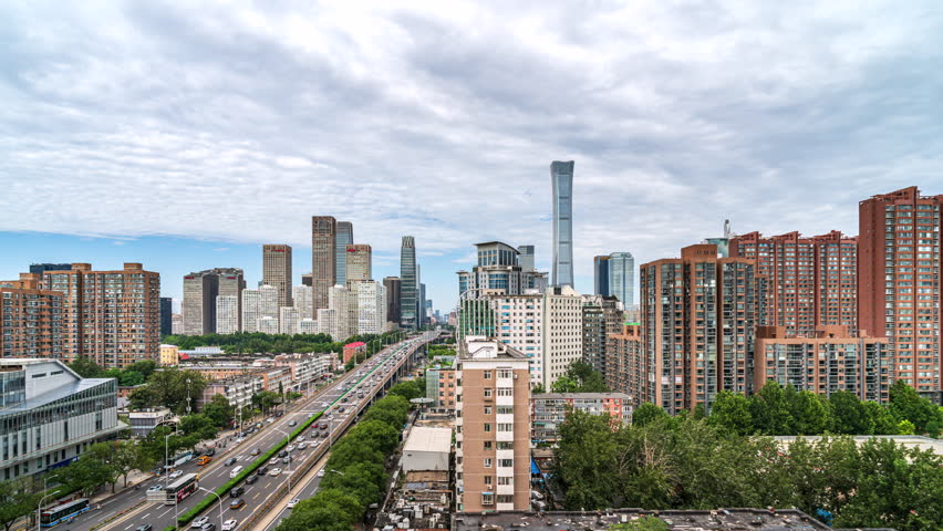 Traffic on elevated highways in Beijing’s central district, with China Zun Tower and the Guomao area