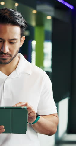 Fitness, instructor and man in gym with tablet, approval or reading for membership sign up. Digital, connection or Asian person in facility with checklist, management and personal trainer in wellness