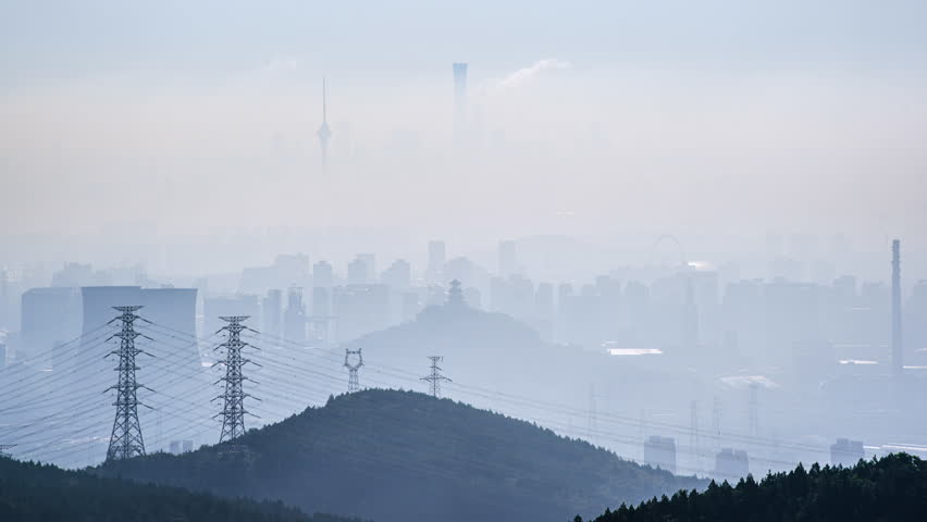 Iconic buildings and cityscape of Beijing, China, shrouded in mist