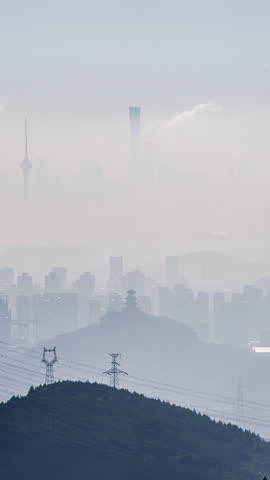 Iconic buildings and cityscape of Beijing, China, shrouded in mist
