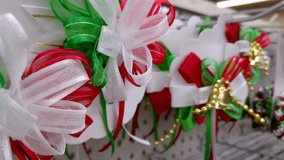 Close-up of colorful Mexican ribbons in red, white and green with gold details, used as festive decorations. - Powered by Shutterstock - Get 15% off with code: PIKWIZARD15